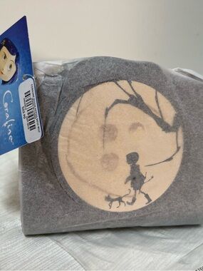 New with tags Coraline Graphic Pouch with Moon Silhouette